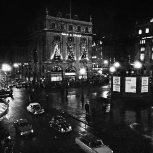 A wet and busy Piccadilly Circus, London, United Kingdom, at night A wet and busy Piccadilly Circus, London, United Kingdom, at night