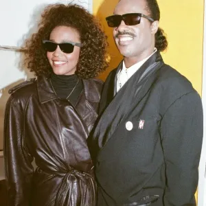 Whitney Houston and Stevie Wonder smile for a photograph backstage at the Nelson Mandela Whitney Houston and Stevie Wonder smile for a photograph backstage at the Nelson Mandela