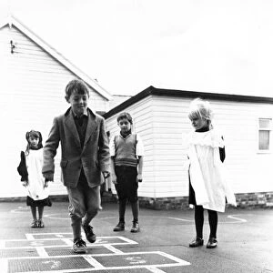 Whittonstall Fist School pupils play hopscotch as part of their 75th anniversary