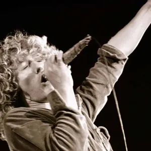 The Who in Concert - May 1976. Roger Daltrey on stage singing at The Valley