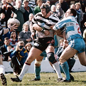 Widnes v Halifax Rugby League. Paul Moriarty takes the pressure