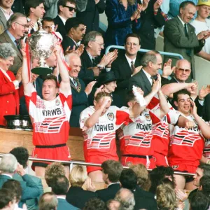 Wigan Captains holds a loft the Rugby League Cup for the 7th sucessive time after beating Wigan Captains holds a loft the Rugby League Cup for the 7th sucessive time after beating