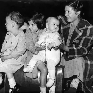 The Wilson family arrive back in London after being evacuated to South Wales The Wilson family arrive back in London after being evacuated to South Wales