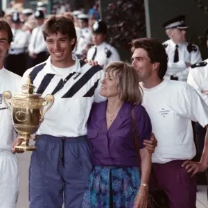 Wimbledon Print: Michael Stich with Trophy and Family, July 1991