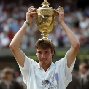 Wimbledon. Mens Final: Michael Stich Lifts Trophy. July 1991 91-4302-264
