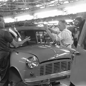 Windscreen being fitted to a Austin Mini van on the production line at Longbridge Windscreen being fitted to a Austin Mini van on the production line at Longbridge