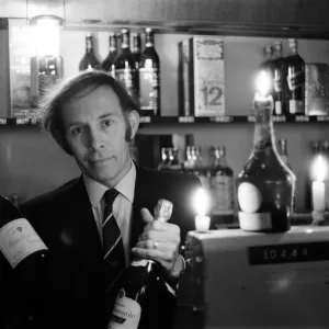 Wine shop, still open during blackout, selling wine by candlelight, Priory Ringway