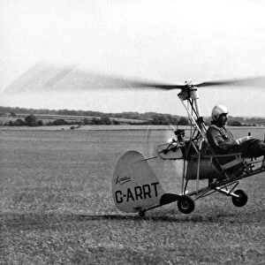 Wing commander Ken Wallis demonstrating his autogyro to the Army at the Air Corps centre