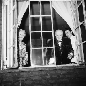 Winston Churchill acknowledges the crowd gathered below his window at his home in Hyde Winston Churchill acknowledges the crowd gathered below his window at his home in Hyde