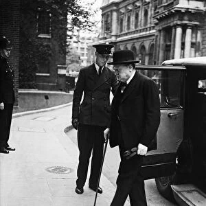 Winston Churchill arriving at Number 10 Downing Street for a Cabinet meeting following