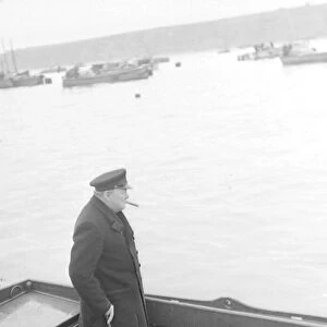 Winston Churchill lands on the Mulberry harbour on Sword Beach for a tour of inspection