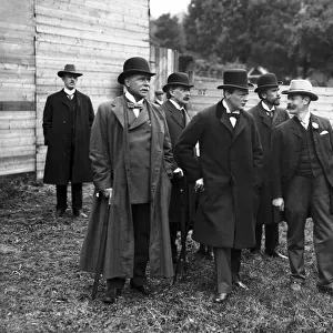 Winston Churchill and Lloyd George standing behind Winston Churchill Left shoulder