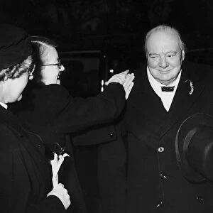 Winston Churchill MP and former WW2 British Prime Minister being congratulated by one of