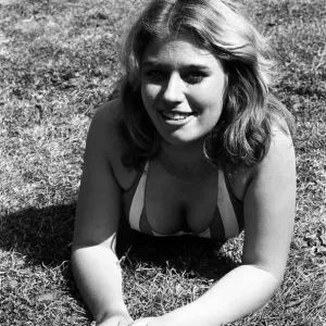 A woman enjoys the heatwave in Broad Lane, Berkshire. June 1976 A woman enjoys the heatwave in Broad Lane, Berkshire. June 1976