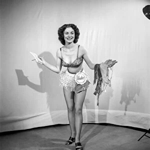 Woman modelling underwear in the Reveille Studio. 1966