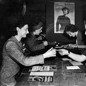 A woman registers for war work at the Burnt Oak labours exchange after they marked at