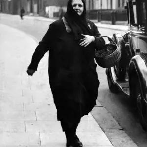 A woman shopper in Manchester. Circa 1936 A woman shopper in Manchester. Circa 1936