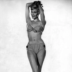 Woman wearing a bikini. June 1962 P011074