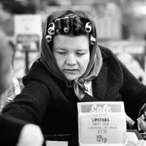 A Woman in Curlers Shopping Sales Print 31st December 1974 A Woman in Curlers Shopping Sales Print 31st December 1974
