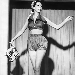Woman wearing a top and shorts May 1952 P017654