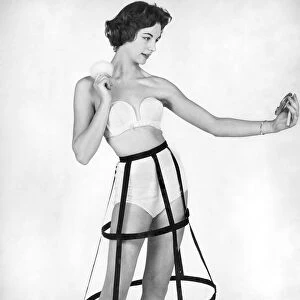 Woman wearing unusual underwear. December 1956 P018249