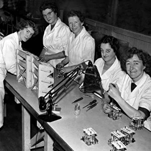 Woman workers in a Manchester electronics factory L-R Olive Birchall, Miss Minnie Slater