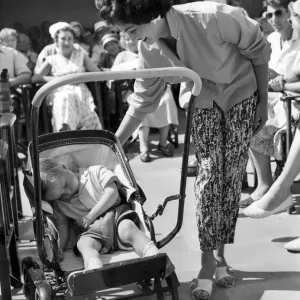 Women: Beauty contest. What all the fuss about as Kenneth Burnett a baby of two sleeps Women: Beauty contest. What all the fuss about as Kenneth Burnett a baby of two sleeps