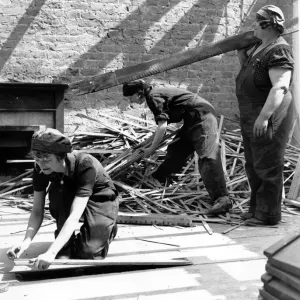 Women builders at work during World War II. June 1941 Women builders at work during World War II. June 1941