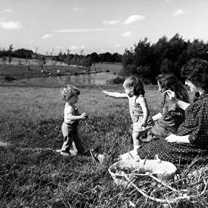 Women and children in Runcorn town park. Runcorn is within the borough of Halton in