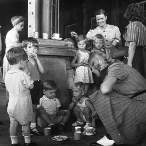 Women and children who were evacuated from the city of Penang Women and children who were evacuated from the city of Penang