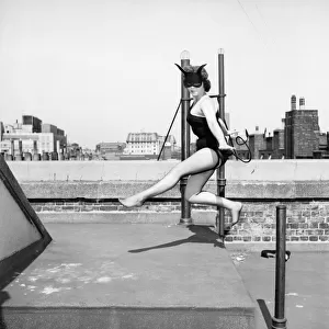 Women dressed as She Devil. Model: Pamela Dennis. May 1957 E270-001