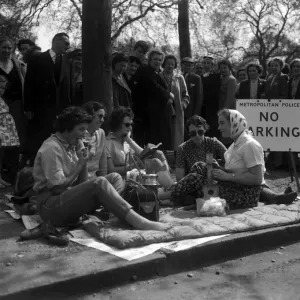 Women having a meal on a mattress in The Mall, waiting for the Royal wedding Women having a meal on a mattress in The Mall, waiting for the Royal wedding