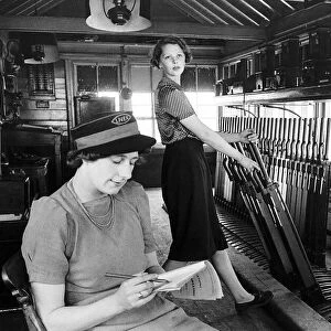 Two women look after the signals on the East Coast main line railway at Warmsworth near