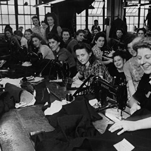 Women poducing uniforms and waterproof Navy clothes at the Lotary Naval Garment Factory