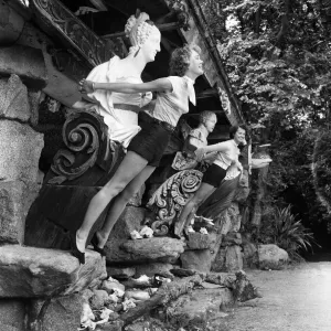 Women posing at Valhalla in the Abbey Gardens in Tresco, Isles of Scilly