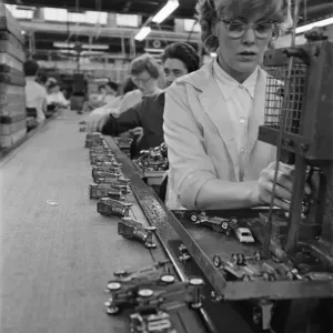 Women assembling Matchbox die cast metal toy cars at Lesney factory, London Women assembling Matchbox die cast metal toy cars at Lesney factory, London