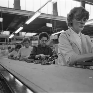 Women part time workers on the production lines at the Lesney toy factory, Hackney Wick Women part time workers on the production lines at the Lesney toy factory, Hackney Wick