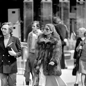 Women walking through the streets of Paris, France. April 1975 75-2099-014