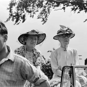 Two women watching an event during Canterbury Week, Kent, August 1947 Two women watching an event during Canterbury Week, Kent, August 1947