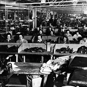 Women at work in a factory sewing leather products. Speke, Liverpool, 8th January 1946