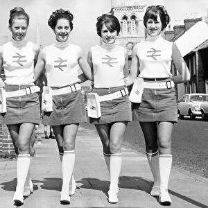 Women workers of British rail wearing the uniform of the company with mini skirts