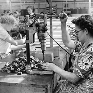 Women workers: Preparing TV aerial parts at the Aerialite factory. August 1955 P005450