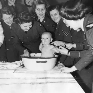 The Womens Auxiliary Air Force (WaF) pay a visit to The Black Prince Nursery in The Womens Auxiliary Air Force (WaF) pay a visit to The Black Prince Nursery in