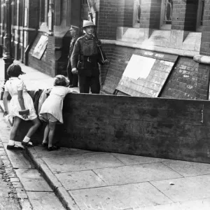 Wooden boards erected outside the Lincoln Drill Hall on Broadgate street in Lincoln city