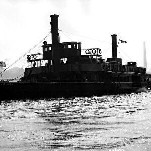 Woolwich Ferry seen here crossing the River Thames. Circa 1925
