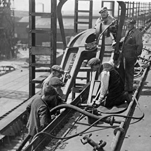 Work being carried on a ship of the Ellerman Lines, a cargo ship. Liverpool