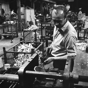 Workers casting moulds on the shop floor of the G. E. C. Foundry, Electric Avenue, Witton Workers casting moulds on the shop floor of the G. E. C. Foundry, Electric Avenue, Witton