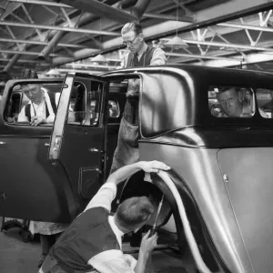 Workers on the Gloria assembly line in the Triumph car factory in Coventry Workers on the Gloria assembly line in the Triumph car factory in Coventry