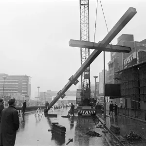 Workmen moving Britains tallest free-standing cross into position at Carrs Lane Workmen moving Britains tallest free-standing cross into position at Carrs Lane