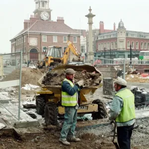 Workmen try to beat the freezing weather, before daytime work on Stockton High Street Workmen try to beat the freezing weather, before daytime work on Stockton High Street